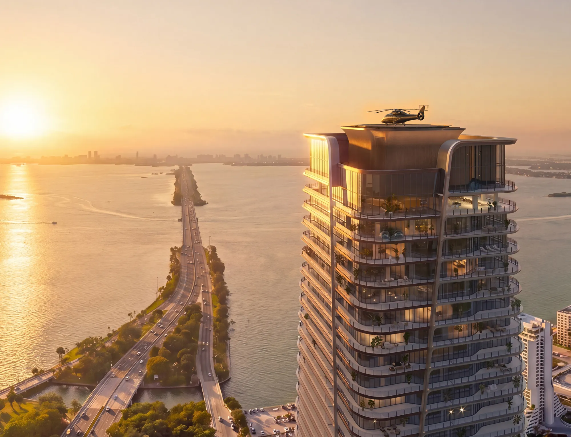 Rooftop helipad atop Anantara Residences Miami at sunset over Biscayne Bay