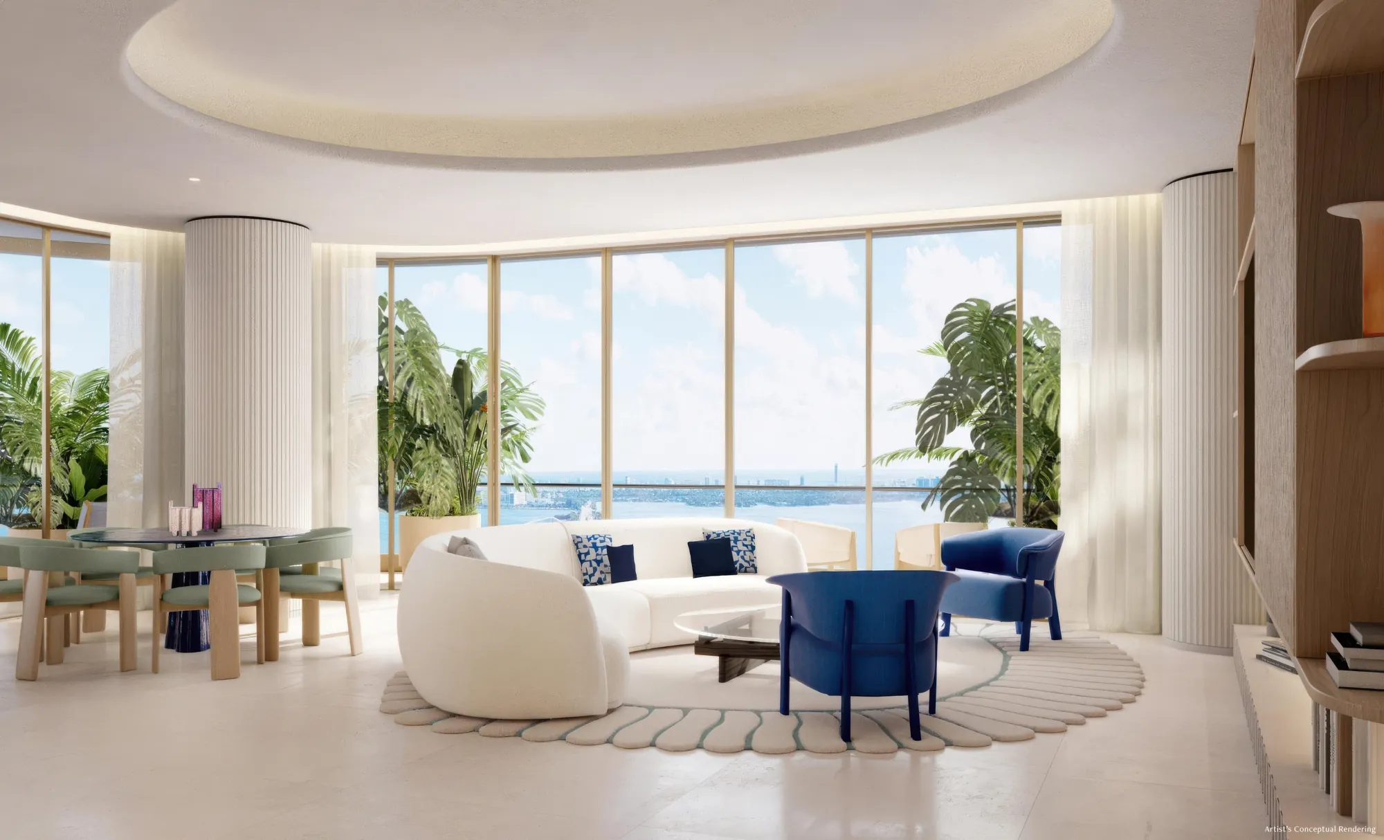Residence living room with curved sofa and floor-to-ceiling bay views
