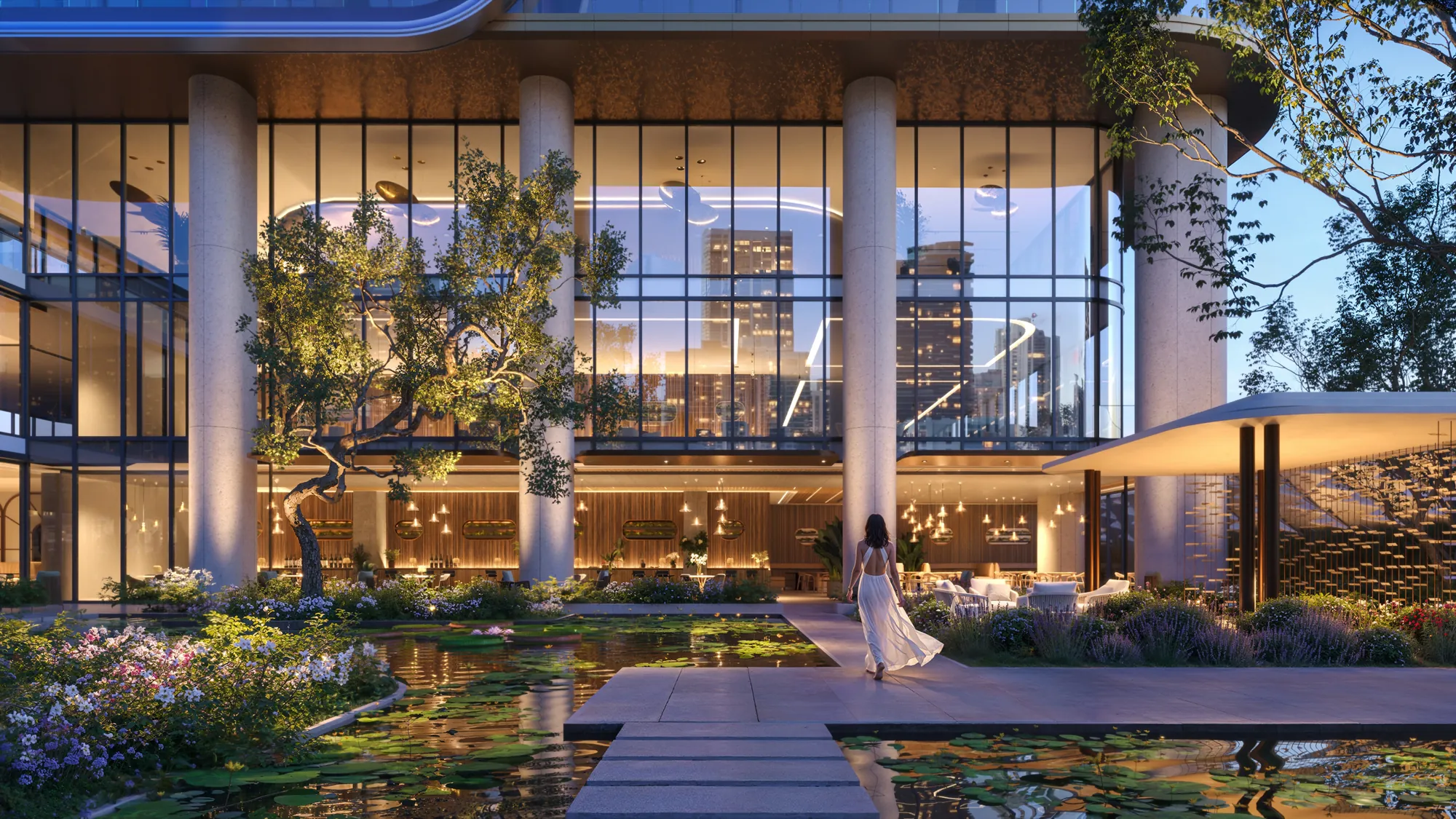 Outdoor amenity garden at twilight with city views